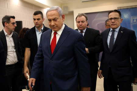 Israel's Prime Minister Benjamin Netanyahu arrives to deliver a statement to the members of the media in Tel Aviv, Israel November 18, 2018. REUTERS/Corinna Kern