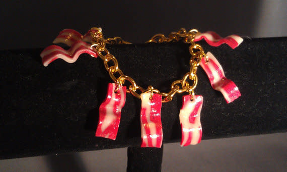 A great way to tell a bacon-lover that you love her almost as much as bacon.   <a href="http://www.etsy.com/listing/115118497/bacon-bracelet?ref=sr_gallery_14&ga_search_query=bacon&ga_view_type=gallery&ga_ship_to=US&ga_page=35&ga_search_type=all">Etsy</a>, <strong>$13</strong>