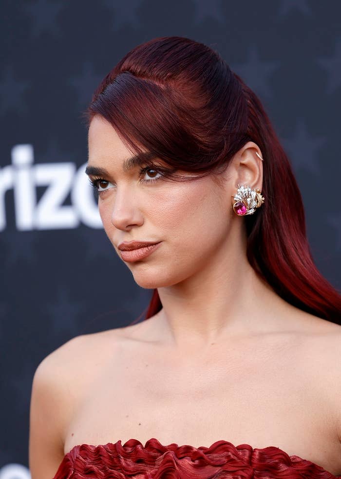 A closeup of Dua Lipa at an event