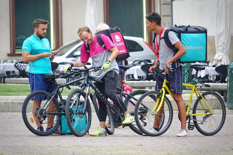 <span class="caption">Gig workers.</span> <span class="attribution"><a class="link " href="https://www.shutterstock.com/image-photo/turin-italy-august-30-2017-bicycle-706093501" rel="nofollow noopener" target="_blank" data-ylk="slk:Mike Dotta / Shutterstock;elm:context_link;itc:0;sec:content-canvas">Mike Dotta / Shutterstock</a></span>