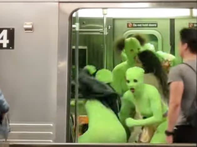 Six women in neon green leotards attacked two women on a New York subway on Sunday afternoon. (Photo: YouTube.com/ Super Friends NYC)