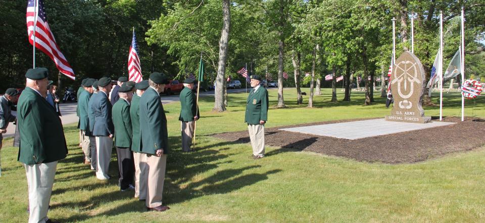 A contingent from RI Chapter 48 of the Special Forces Association conducts a memorial ceremony in front of the Special Forces Memorial at the Rhode Island Veterans Cemetery.
