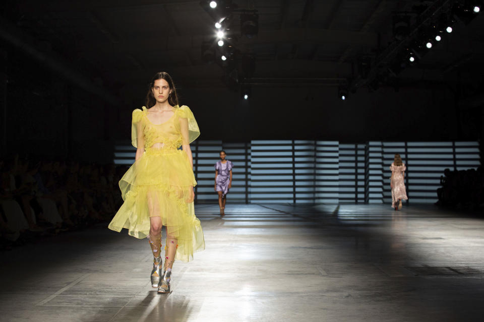 Models display creations by Preen by Thornton Bregazzi at the Spring/Summer 2020 fashion week runway show presented in London, Sunday, Sept. 15, 2019. (Kate Collins/PA via AP)