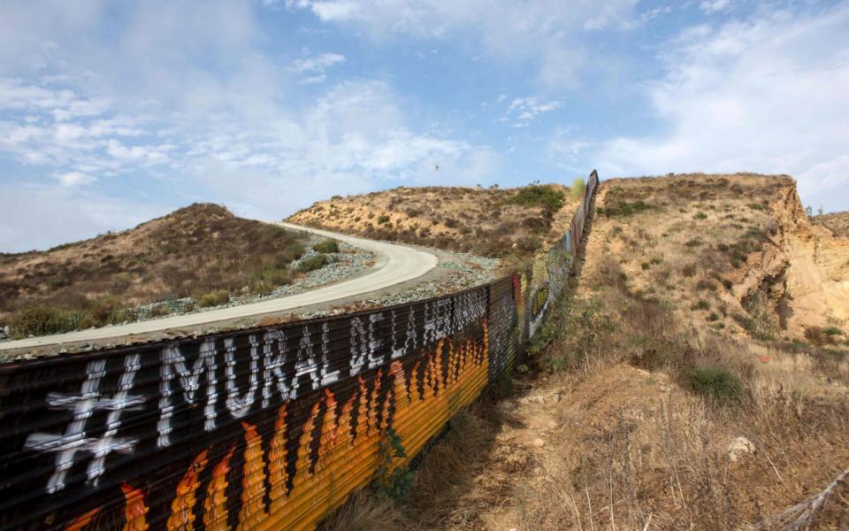 Part of the current US-Mexico border wall  - Credit: AFP