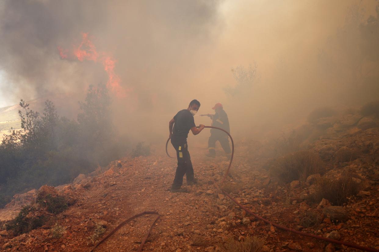 Wildfire burning near the village of Kandyli, near Athens (REUTERS)