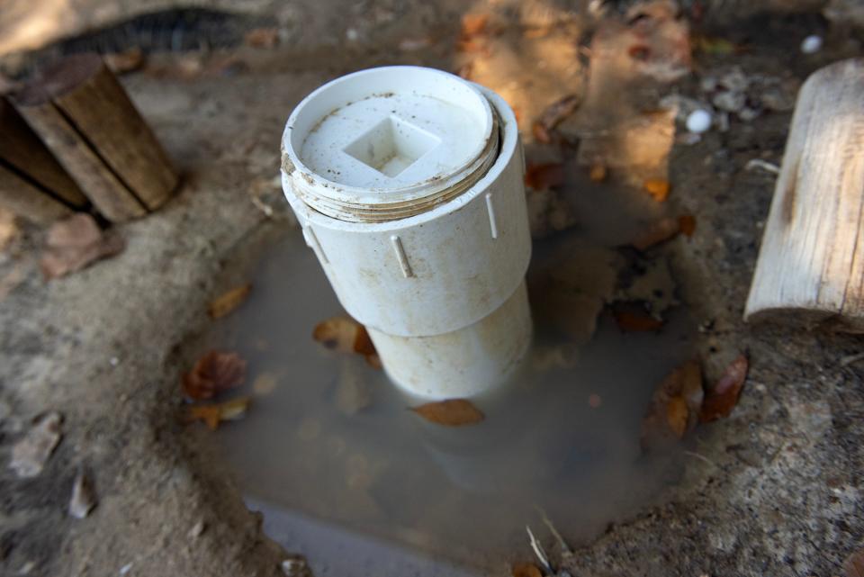 Yolanda R. Brinston, owner of a Habitat for Humanity-built house on Smith Robinson Street in Jackson explained Tuesday, Oct. 24, that if she doesn't unscrew the lid to the sewage pipe in her front yard, sewage backs up into the house.