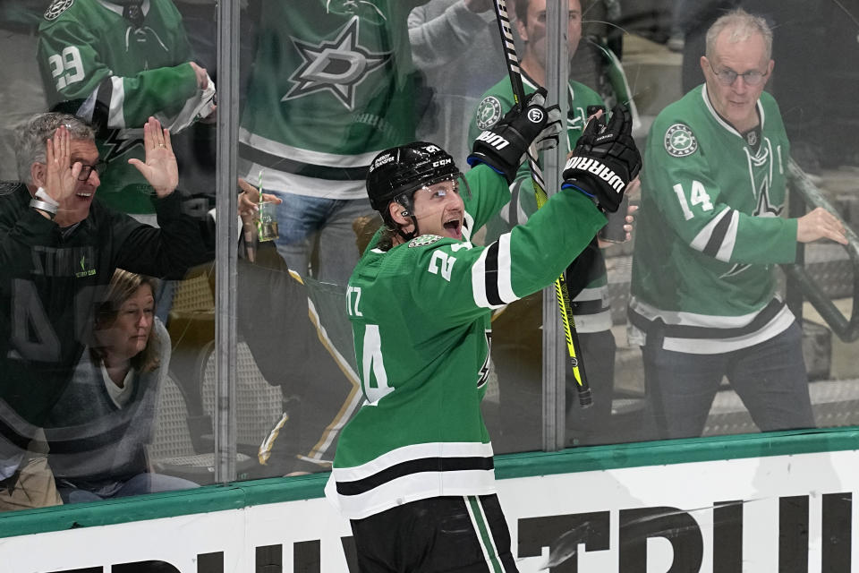 Dallas Stars center Roope Hintz celebrates after scoring his third goal of the game that came in the third period of Game 2 of an NHL hockey Stanley Cup first-round playoff series against the Minnesota Wild, Wednesday, April 19, 2023, in Dallas. (AP Photo/Tony Gutierrez)