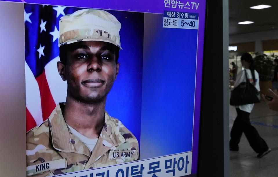 A TV screen shows a file image of American soldier Travis King during a news program at the Seoul Railway Station in Seoul, South Korea, Monday, July 24, 2023. The deputy commander of the U.N. Command said Monday it has started conversations with North Korea over King who ran into the North last week across the Koreas' heavily armed border. (AP Photo/Ahn Young-joon)