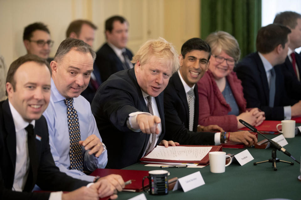 LONDON, ENGLAND - FEBRUARY 14: British Prime Minister Boris Johnson speaks flanked by his new Chancellor of the Exchequer Rishi Sunak (4th R) following a reshuffle at Downing Street on February 14, 2020 in London, England. The Prime Minister reshuffled the Cabinet yesterday. High profile changes were Attorney General Geoffrey Cox, Business Secretary Andrea Leadsom, Housing Minister Esther McVey and Northern Ireland Minister Julian Smith all sacked and Chancellor Sajid Javid resigned. (Photo by Matt Dunham - WPA Pool/Getty Images)