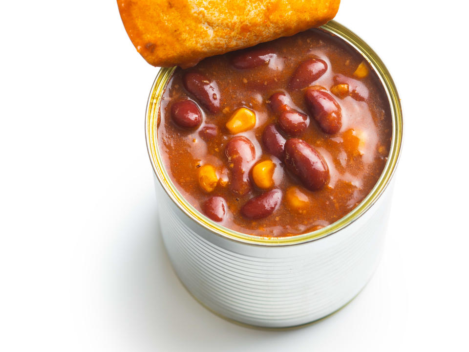 Canned chili open on a white background. (Photo via Getty Images)