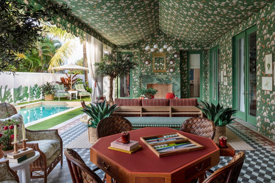 Designer Chloe Warner of Redmond Aldrich Design used yards and yards of a custom-designed fabric, Peony Chintz, to decorate her first-floor loggia in the Kips Bay Decorator Show House Palm Beach.