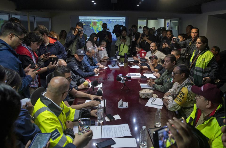A briefing with city officials is given during an emergency meeting with Tijuana city officials for Tropical Storm Hilary at Tijuana Police Headquarters on Sunday, Aug. 20, 2023, in Tijuana, Baja California. (Ana Ramirez/The San Diego Union-Tribune via AP)