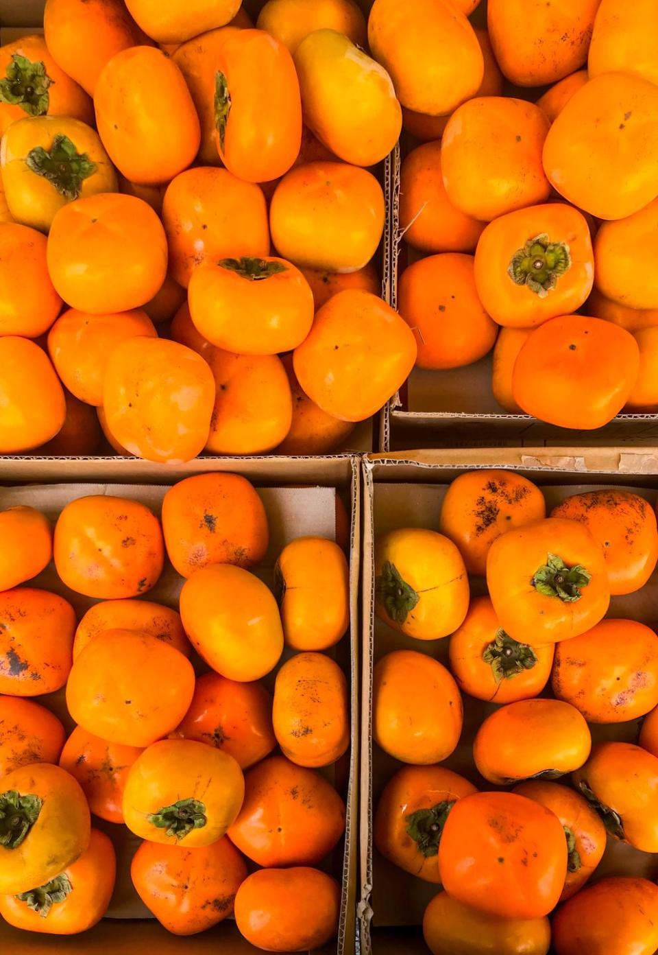 <p>If you're looking to expand your fall fruit palate, give persimmons a whirl. They come in two varieties — one that's larger and very soft when ripe with an almost pudding-like consistency, and a smaller, crunchier version that you can slice up for texture in a dish. Both are great sources of<a href="https://www.redbookmag.com/body/healthy-eating/g19733441/best-vitamin-a-foods/" rel="nofollow noopener" target="_blank" data-ylk="slk:vitamins A;elm:context_link;itc:0;sec:content-canvas" class="link "> vitamins A</a> and C, fiber, and B-complex vitamins. See, change <em>can </em>be good. <br></p>