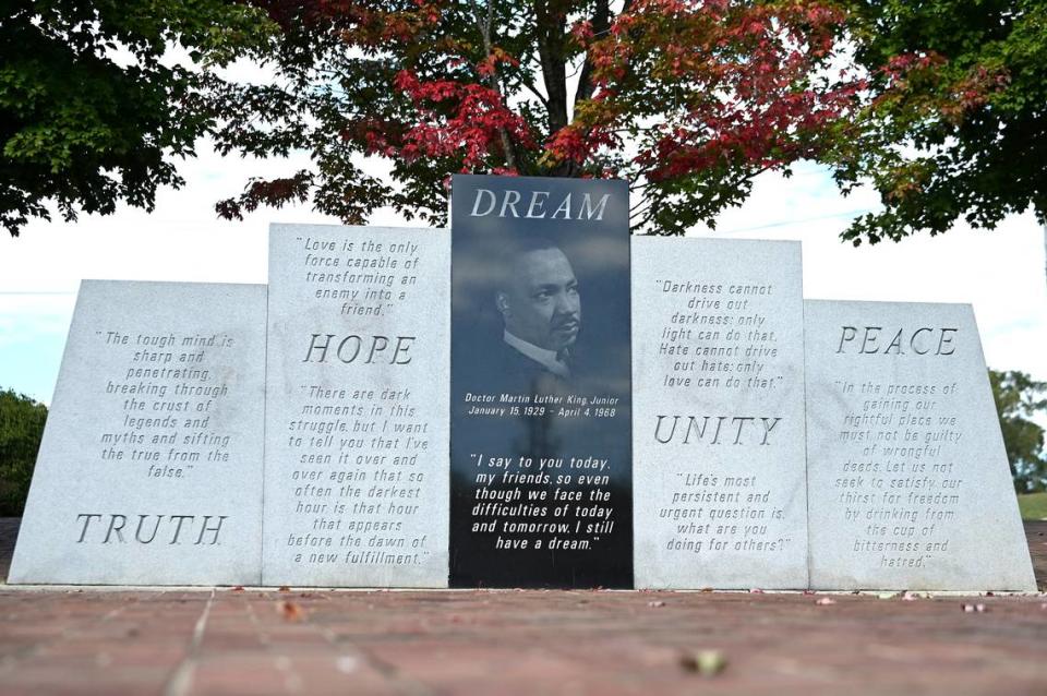 Graffiti is faintly visible on the left and right panels of the Dr. Martin Luther King Jr., monument on Cabarrus Avenue in Concord, NC on Monday, October 9, 2023. Over the weekend the monument was vandalized. The Concord Police Department is currently investigating and city crews worked to restore the monument.