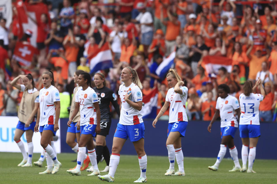 Netherlands' players celebrate after winning the Women Euro 2022 soccer match between Switzerland and Netherlands at Bramall Lane Stadium in Sheffield, England, Sunday, July 17, 2022. The Netherlands won 4-1. (AP Photo/Leila Coker)