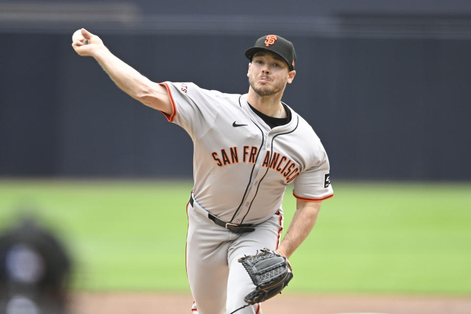 San Francisco Giants starting pitcher Daulton Jeffries delivers during the first inning of the team's baseball game against the San Diego Padres, Sunday, March 31, 2024, in San Diego. (AP Photo/Denis Poroy)