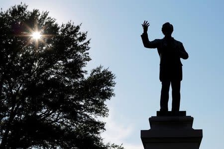 A statue of Jefferson Davis, President of the Confederate States, stands in Memphis Park, formerly named Confederate Park, in Memphis, Tennessee, U.S., August 19, 2017. REUTERS/Brian Snyder/Files