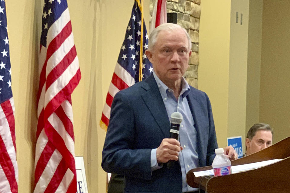 In this Jan. 11, 2020 photo, former U.S. Attorney General Jeff Sessions speaks to the Mid Alabama Republican Club in Vestavia Hills, AL. Sessions is stressing his loyalty to President Donald Trump as he seeks to regain the Alabama Senate seat he held for 20 years. (AP Photo/Kim Chandler)