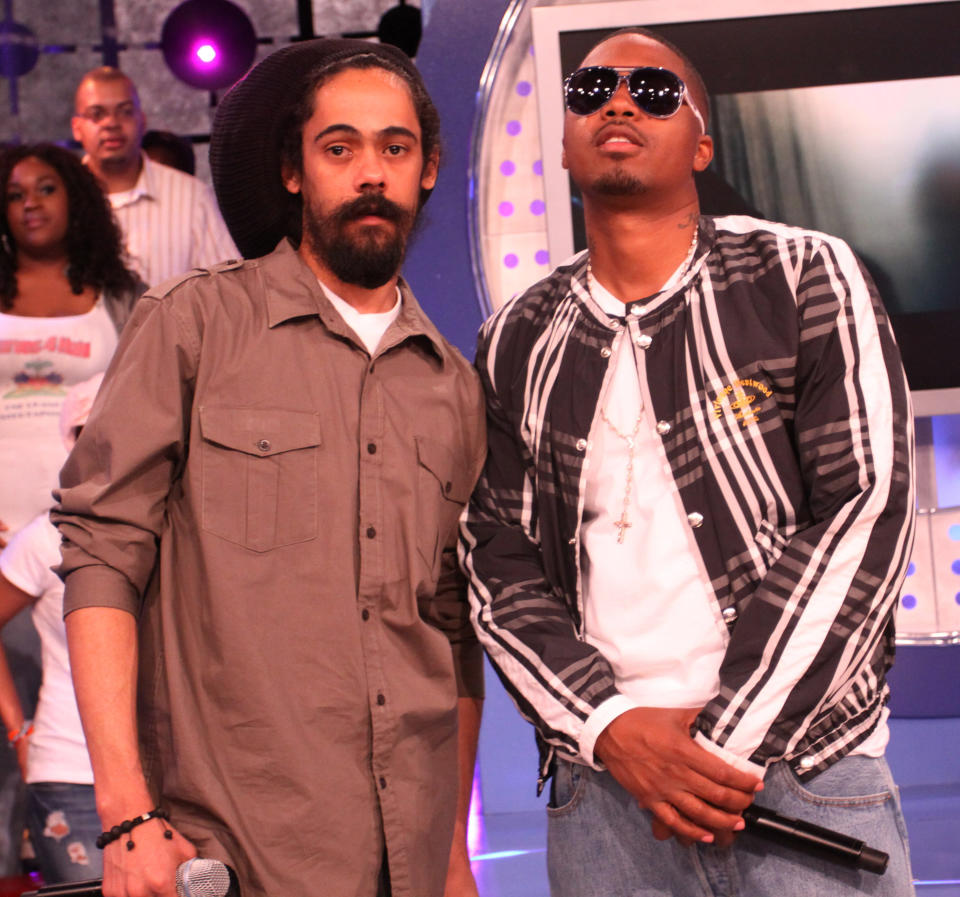 Nas and Damian Marley pose for a photo together on the set of 106 & Park on BET.