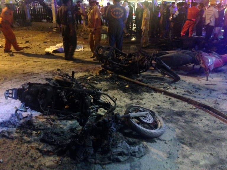 Destroyed motorbikes are seen at the scene of devastation after a bomb exploded outside a religious shrine in central Bangkok late on August 17, 2015