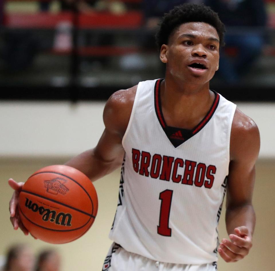 Lafayette Jeff Bronchos Akeem Wilson (1) drives to the basket during the IHSAA boys basketball game against the Harrison Raiders, Friday, Dec. 9, 2022, at Lafayette Jeff High School in Lafayette, Ind. Harrison won won 45-42.