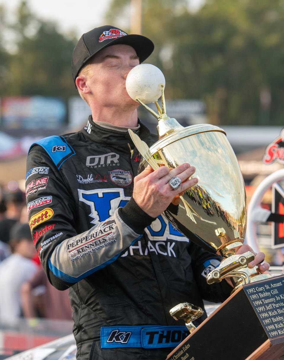 Derek Thorn celebrates after winning the 55th annual Snowball Derby at Five Flags Speedway Sunday, December 4, 2022.