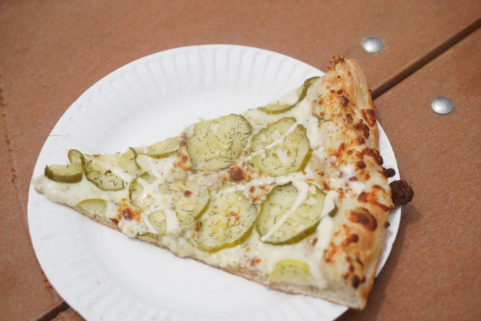 A pickle pizza burger from the Spaghetti Eddie's food stall at the Delaware State Fair on July 20, 2023.