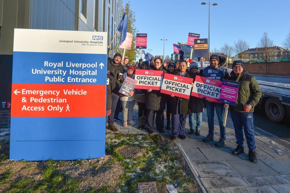 Members of the Royal College of Nursing on the picket line outside the Royal Liverpool University Hospital (PA Wire)