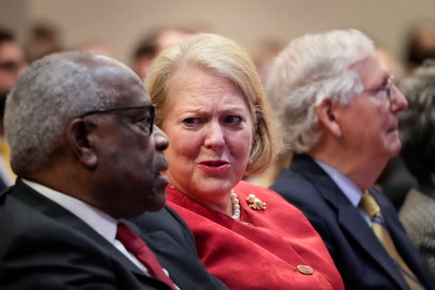 Supreme Court Justice Clarence Thomas with his wife and conservative activist Ginni Thomas while he waits to speak Oct 21, 2021, at the Heritage Foundation in Washington, D.C. (Photo: Drew Angerer via Getty Images)