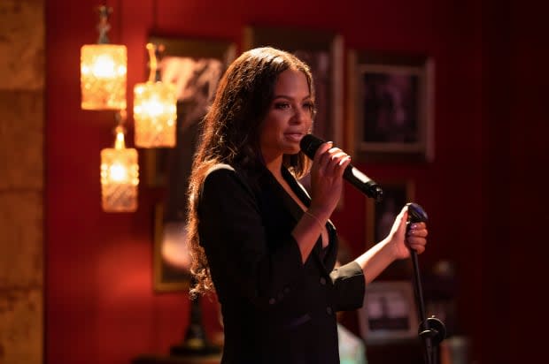 Milian as Erica singing producer Alicia Keys's hit, 'No One' in 'Resort to Love.'<p>Photo: Courtesy of Netflix</p>