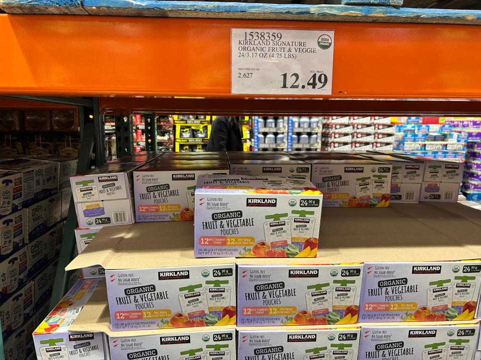 boxes of applesauce pouches on the shelves at Costco