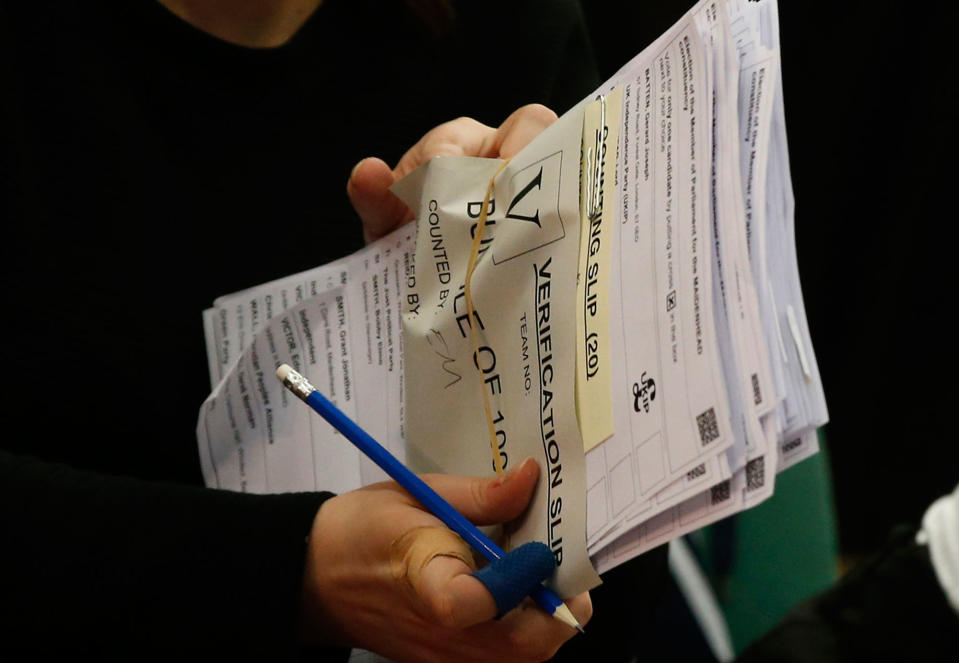 <p>Ballots are counted and verified by election staff, in the Magnet Leisure Centre Maidenhead, the constituency of Prime Minister Theresa May, in Maidenhead, England, Thursday, June 8, 2017. (Photo: Alastair Grant/AP) </p>