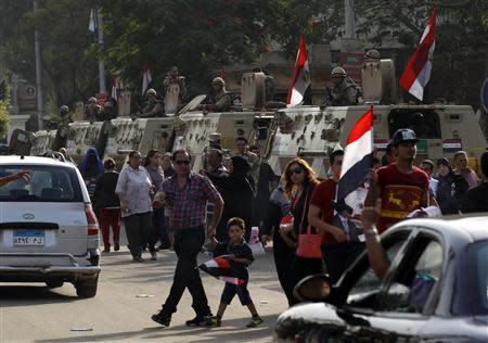 Soldiers secure a road during the presidential elections in Cairo May 26, 2014. REUTERS/Mohamed Abd El Ghany