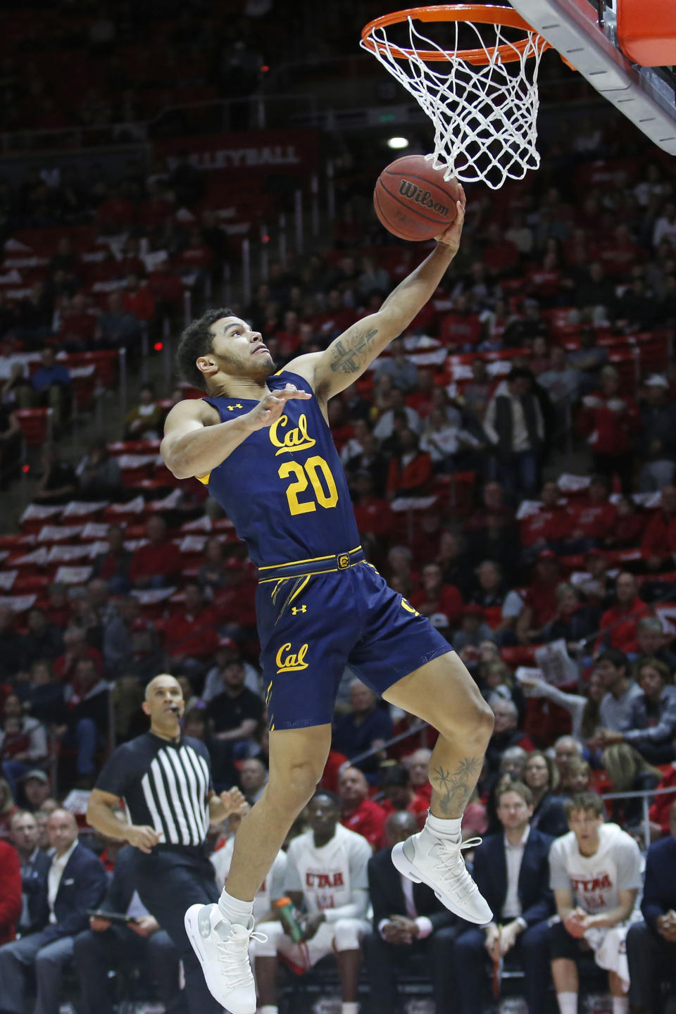 California guard Matt Bradley goes to the basket during the first half of the team's NCAA college basketball game against Utah on Saturday, Feb. 8, 2020, in Salt Lake City. (AP Photo/Rick Bowmer)