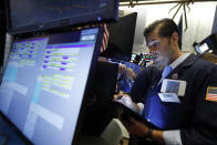 Trader Thomas Donato works on the floor of the New York Stock Exchange, Friday, July 19, 2019. U.S. stocks moved broadly higher in early trading on Wall Street Friday and chipped away at the week's losses. (AP Photo/Richard Drew)