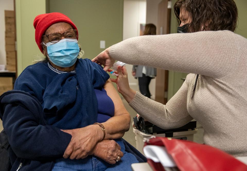 Mary Boykin, 93, Indianapolis, gets a COVID-19 vaccination from physician assistant Jeanna Francis at IU Health Neuroscience Center on Jan. 28.