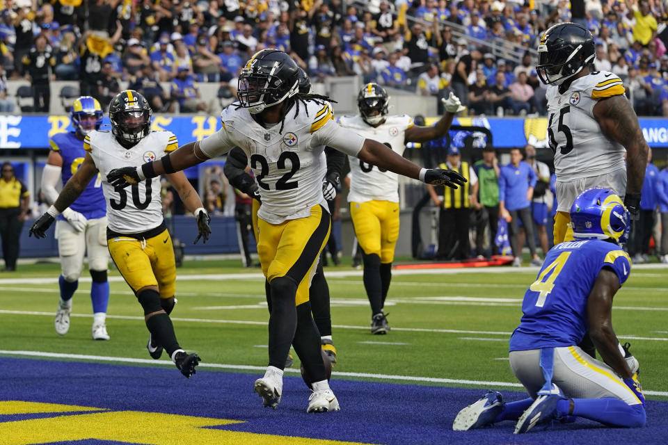 Pittsburgh Steelers running back Najee Harris, center, celebrates his touchdown as Los Angeles Rams safety Jordan Fuller, right, kneels on the ground during the second half of an NFL football game Sunday, Oct. 22, 2023, in Inglewood, Calif. (AP Photo/Gregory Bull)