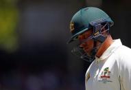 Cricket - Australia v South Africa - First Test cricket match - WACA Ground, Perth, Australia - 7/11/16. Australia's Usman Khawaja reacts as he walks off the ground after he was dismissed LBW at the WACA Ground in Perth. REUTERS/David Gray