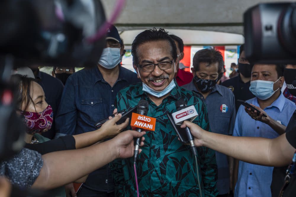 Former Sabah chief minister Tan Sri Musa Aman speaks to reporters while campaigning in Kiulu September 18, 2020. — Picture by Firdaus Latif