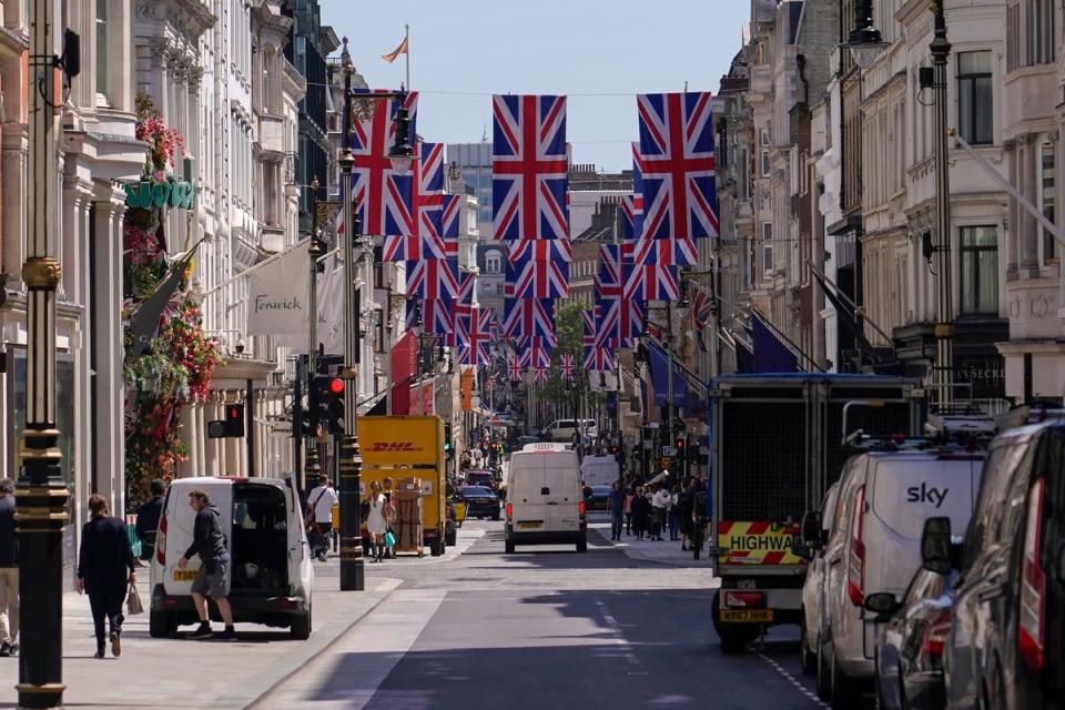 New Bond Street is decorated with Union flags in London (AP)