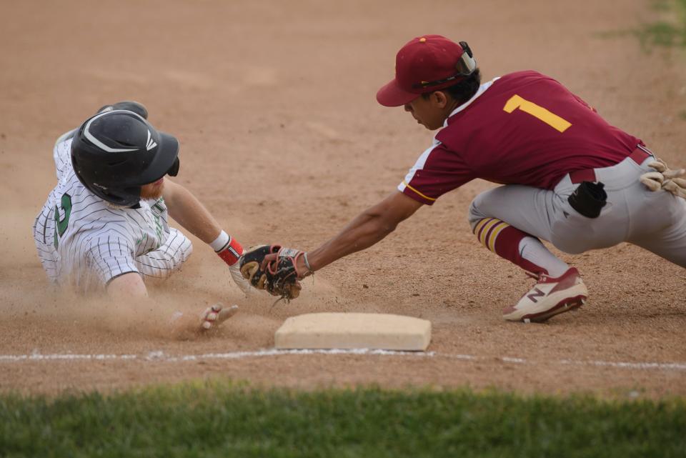Barstow’s Julian Duran reaches for the tag at third base during the fourth inning on Wednesday, April 12, 2023. Victor Valley defeated Barstow 6-3.