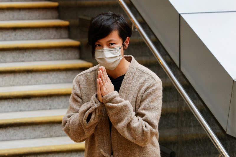 Stand News former director and Singer Denise Ho leaves the police station on bail in Hong Kong