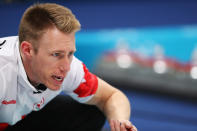 <p>Canada’s Marc Kennedy throws the stone during the curling men’s round robin session between Canada and Sweden during the Pyeongchang 2018 Winter Olympic Games at the Gangneung Curling Centre in Gangneung on February 17, 2018. </p>