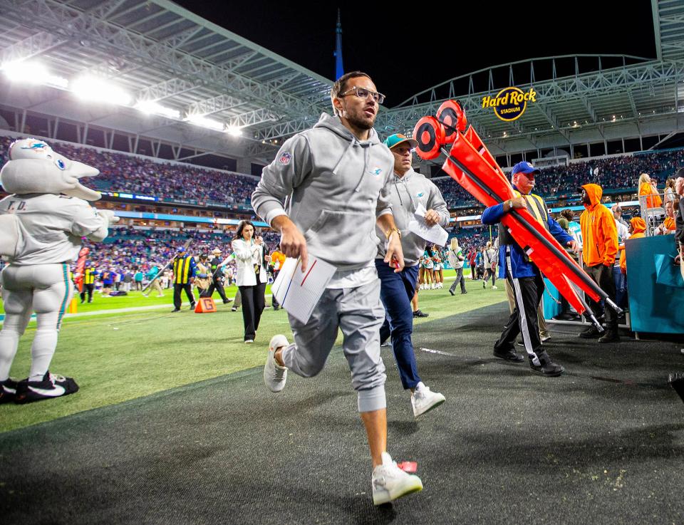 Miami Dolphins head coach Mike McDaniel runs off the field following a defeat at the hands of their conference rivals the Buffalo Bills during NFL football game Jan 07, 2024, in Miami Gardens.