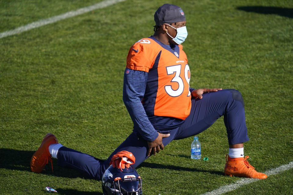 Denver Broncos safety Kahani Smith takes part in drills during an NFL football practice at the team's heasdquarters Wednesday, Nov. 25, 2020, in Englewood, Colo. (AP Photo/David Zalubowski)