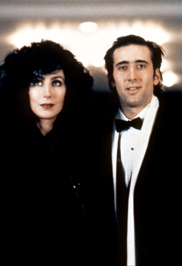 Cher and Nicolas Cage in "Moonstruck"<p><a href="https://www.gettyimages.com/detail/607399648" rel="nofollow noopener" target="_blank" data-ylk="slk:Sunset Boulevard/Getty Images;elm:context_link;itc:0;sec:content-canvas" class="link ">Sunset Boulevard/Getty Images</a></p>