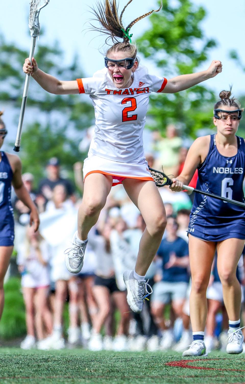 Thayer Academy's Caroline Lally celebrates during the ISL championship game against Nobles at Milton Academy on Monday, May 23, 2022.