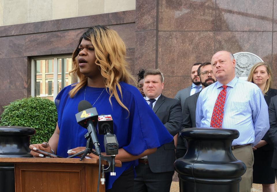 FILE - Lead plaintiff Kayla Gore speaks at a news conference outside the federal courthouse in Nashville, Tenn., Tuesday, April 23, 2019. The fate of a decades-old Tennessee law that does not allow transgender people to change the sex designation on their birth certificates is in the hands of a federal appeals court. (AP Photo/Travis Loller, File)