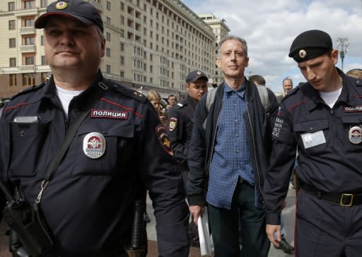 British gay rights activist Peter Tatchell was arrested after staging a one-man protest in Moscow