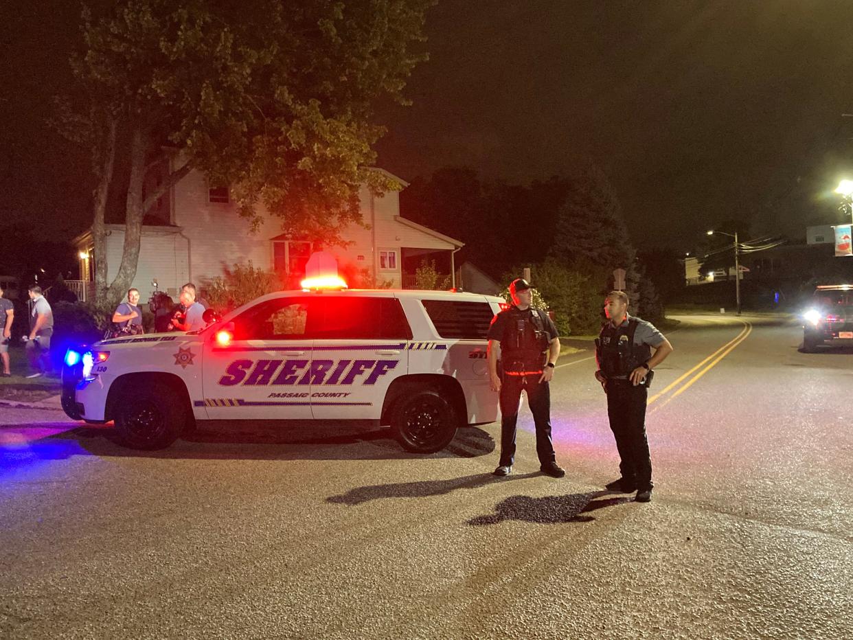 Police set up a road block in Wayne on Friday, Aug. 30, 2024, following reports of shooting at a high school football game between Passaic County Tech and a team from Burlington County.